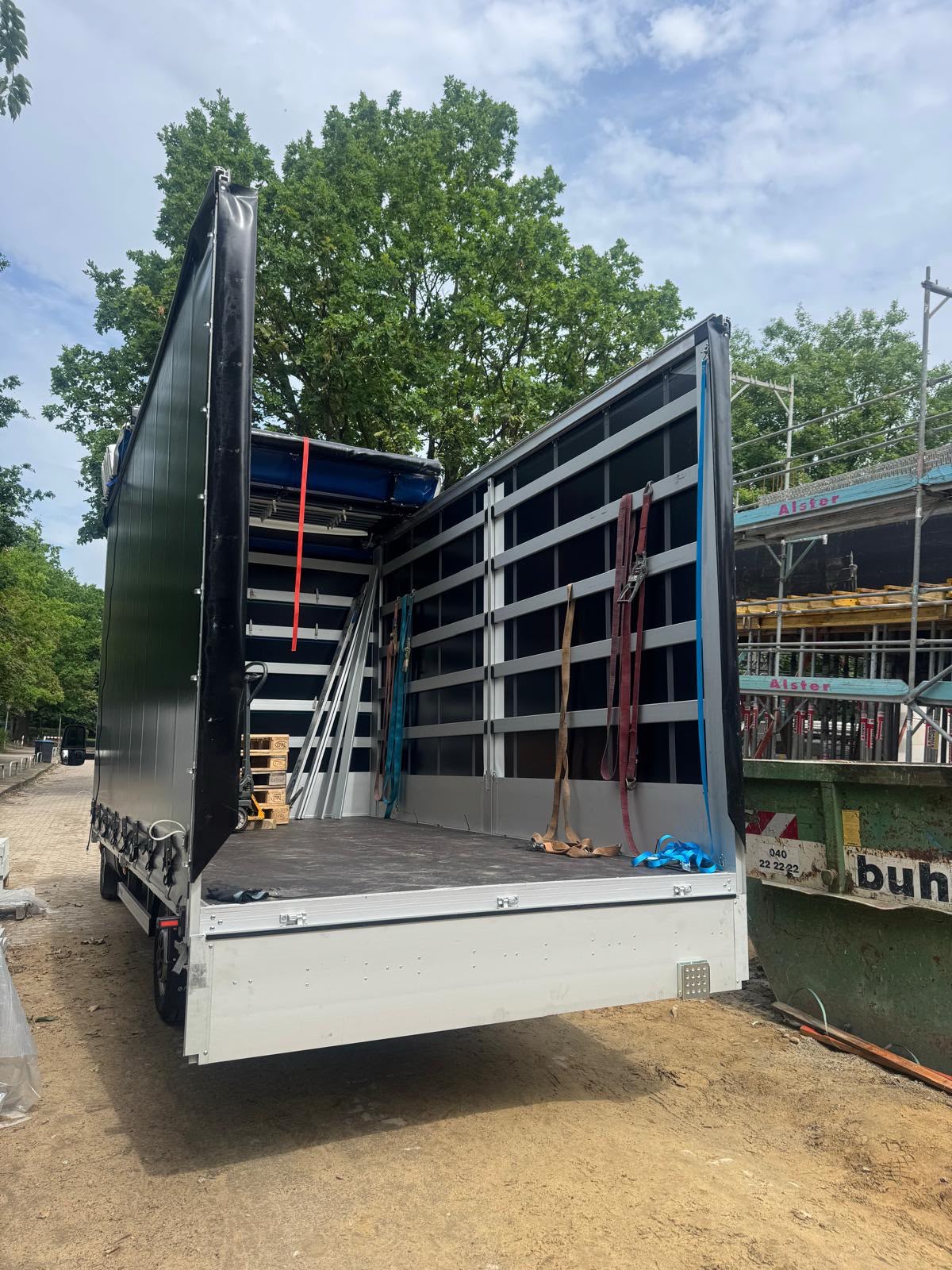 Podsada Transport trailer unloading at the seaport – maritime logistics Hamburg
