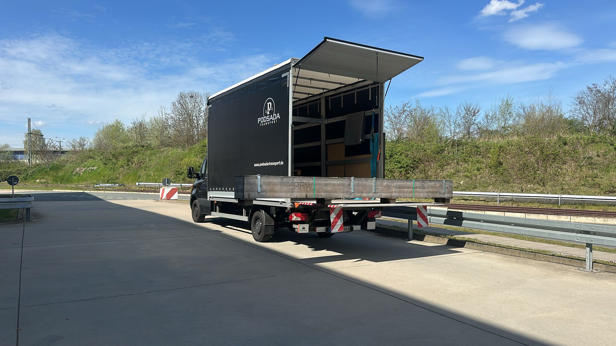 Podsada Transport truck at a highway rest stop during domestic transport